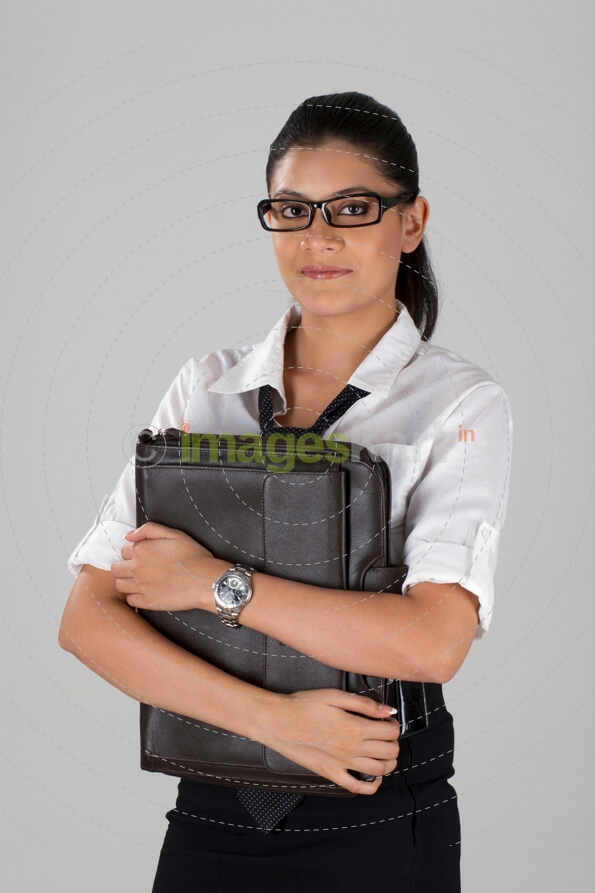 working woman with a laptop bag