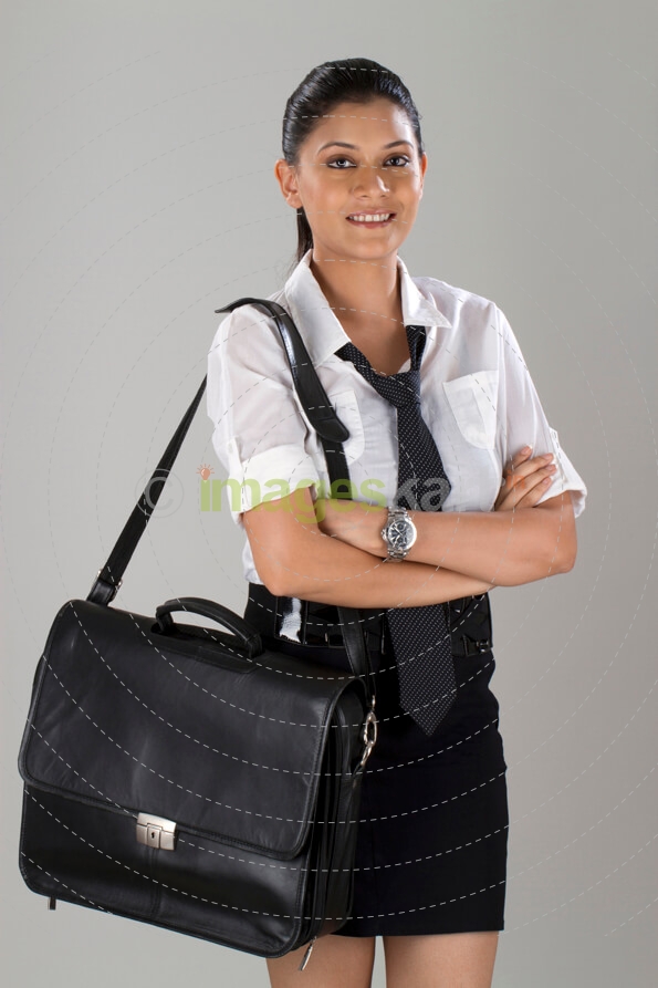 working woman folding hands and standing