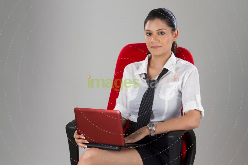 corporate woman posing while working