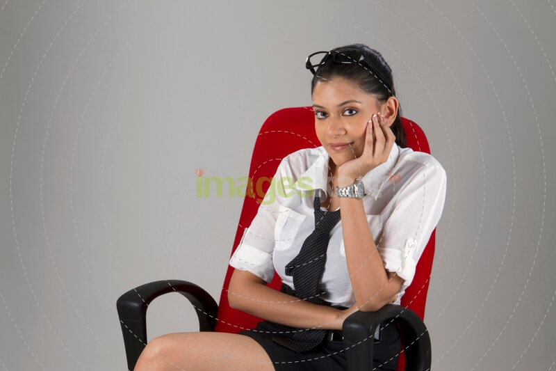 working woman sitting on a chair