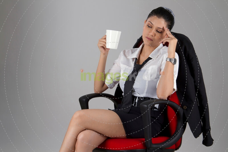 stressed woman with a coffee mug