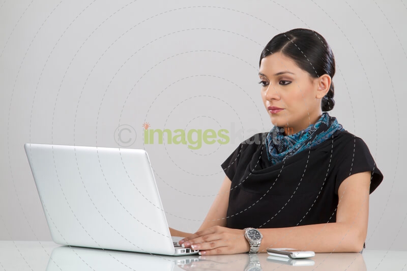 woman working on a laptop 