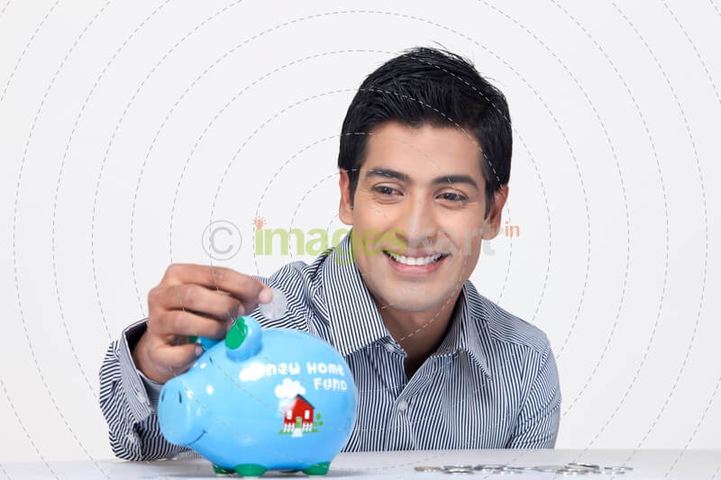 close-up of a man saving his money