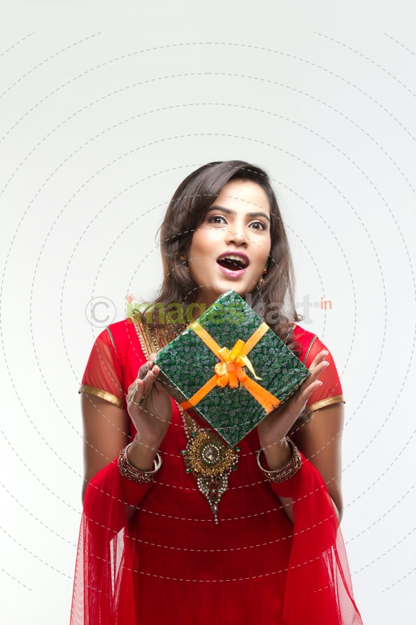 surprised woman with a gift