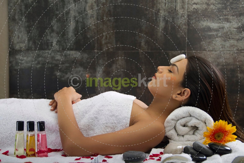 woman ready for hot stone massage
