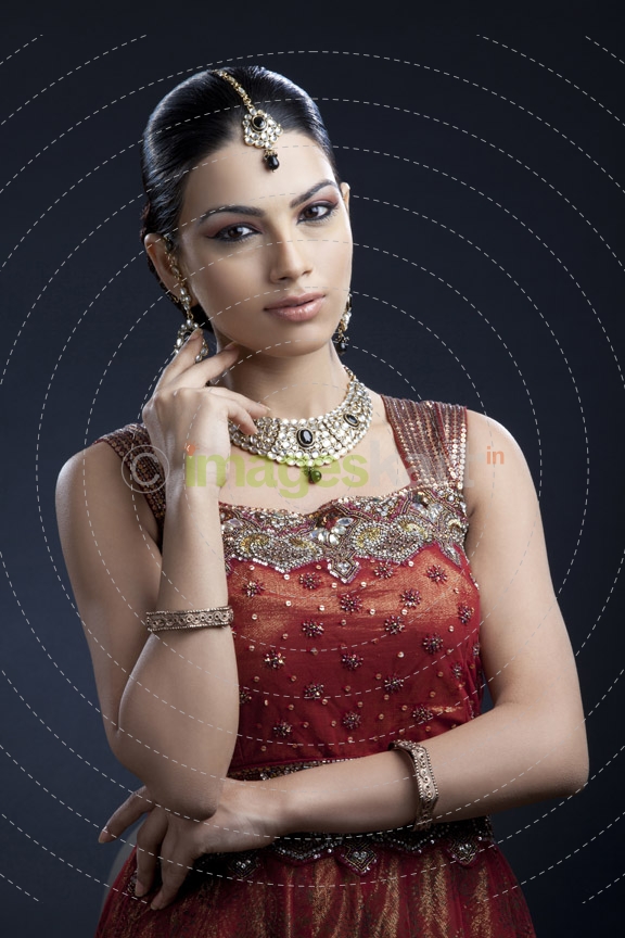 traditionally dressed woman posing