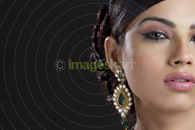 half face of a woman posing