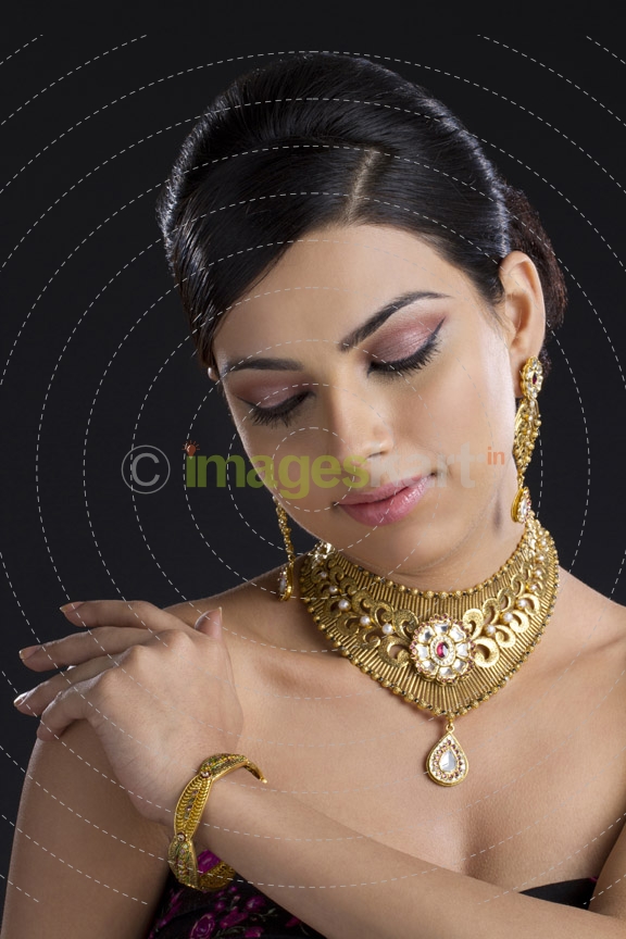 beautiful woman posing with jewellery