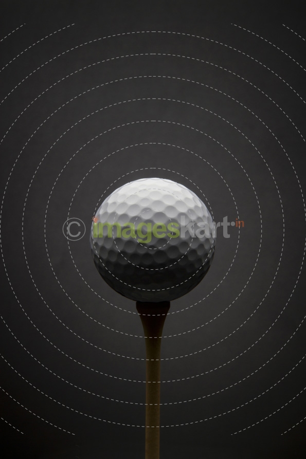 Golf ball with dark grey background