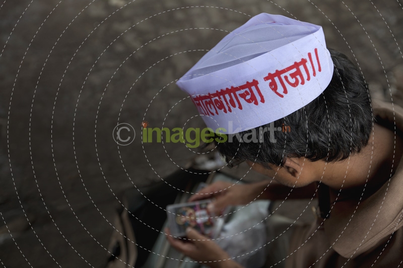man preparing himself for ganpati festival in india 