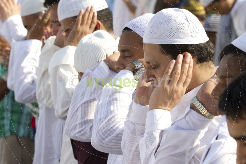 muslim during eid prayer at mosque 