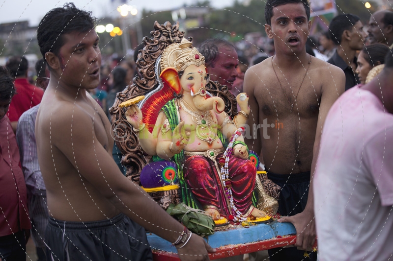 people celebrating ganesh visarjan 