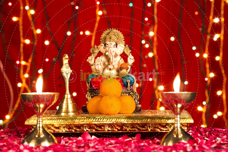 lord ganesha with ladoos