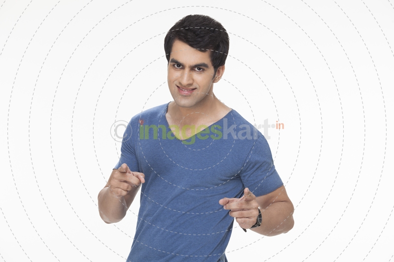 young man pointing his fingers