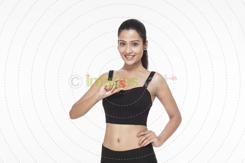 girl posing with alphabet S