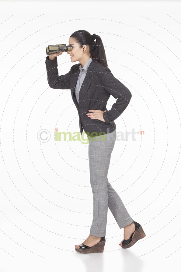 woman looking at something through binocular 