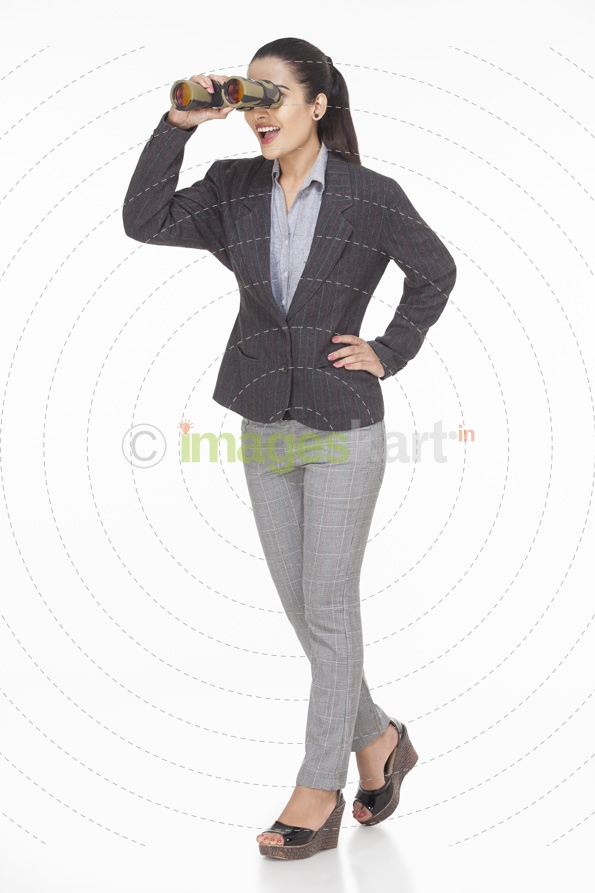 full length picture of a girl looking through binocular