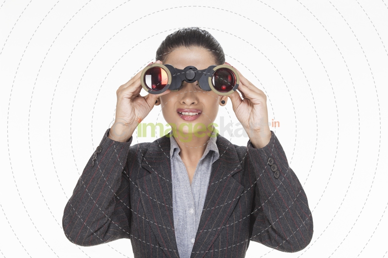 woman crying while looking through binocular