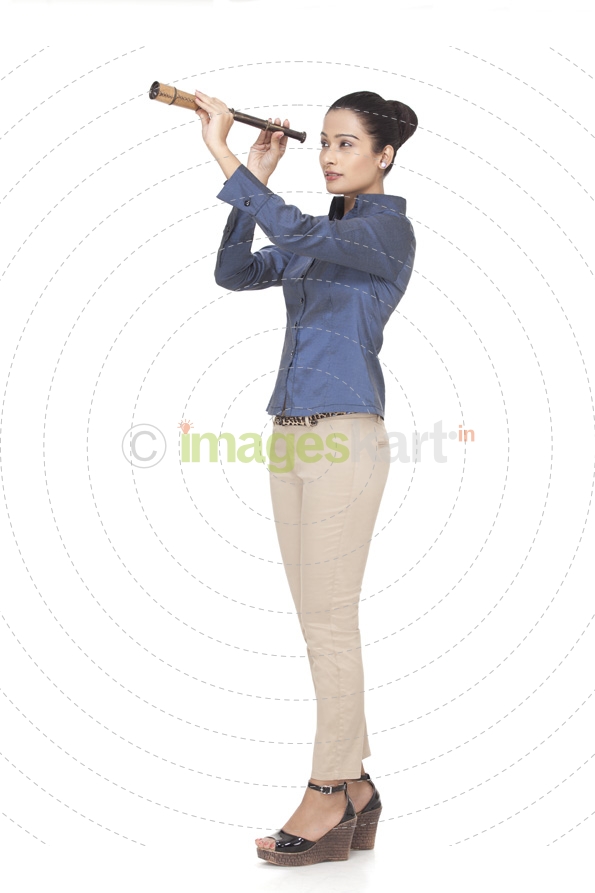 young business woman looking through telescope 