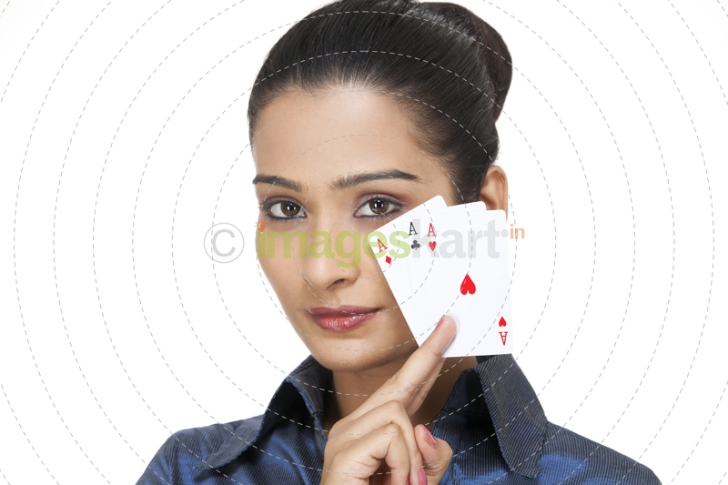 girl posing with playing cards 