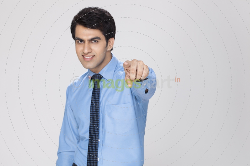 young executive pointing at something 