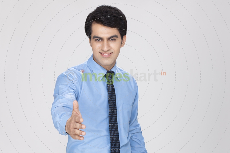 man showing hand for handshake 