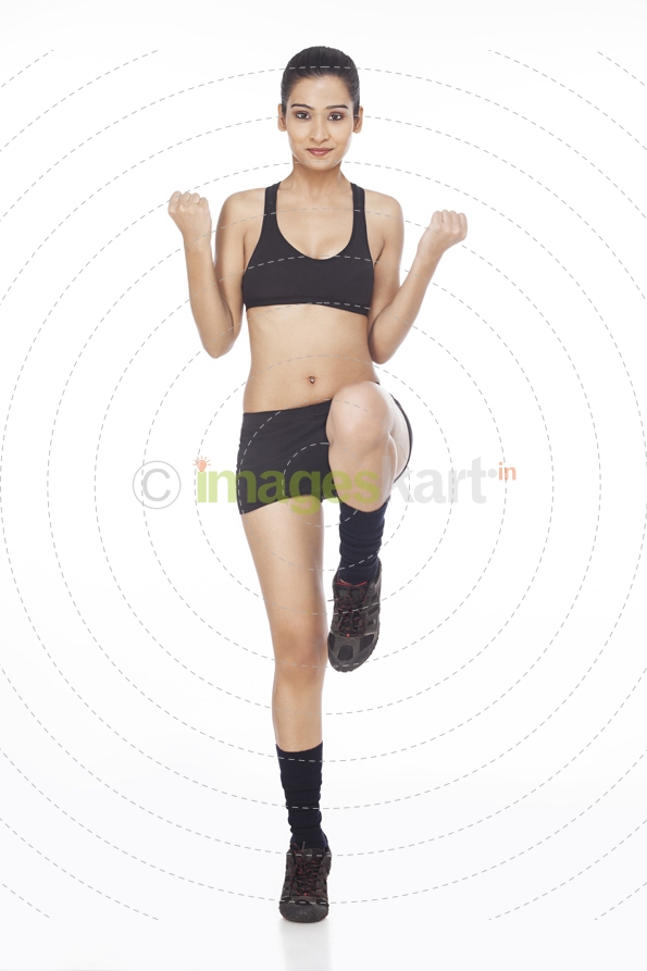 girl exercising in sports wear