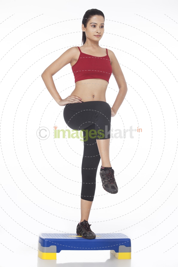 girl exercising at gym
