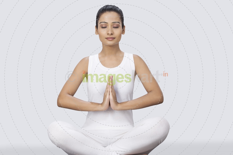 woman doing padmasana