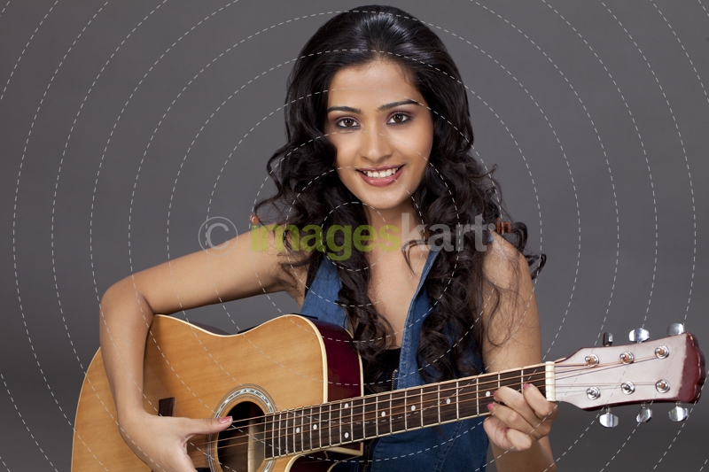 girl playing guitar 