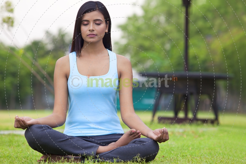 girl posing in mudra position