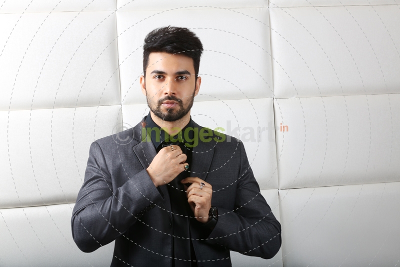 man at work fixing his tie