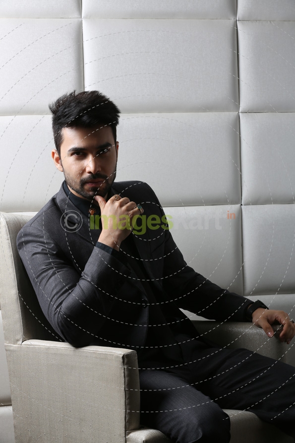man in formal wear posing with attitude