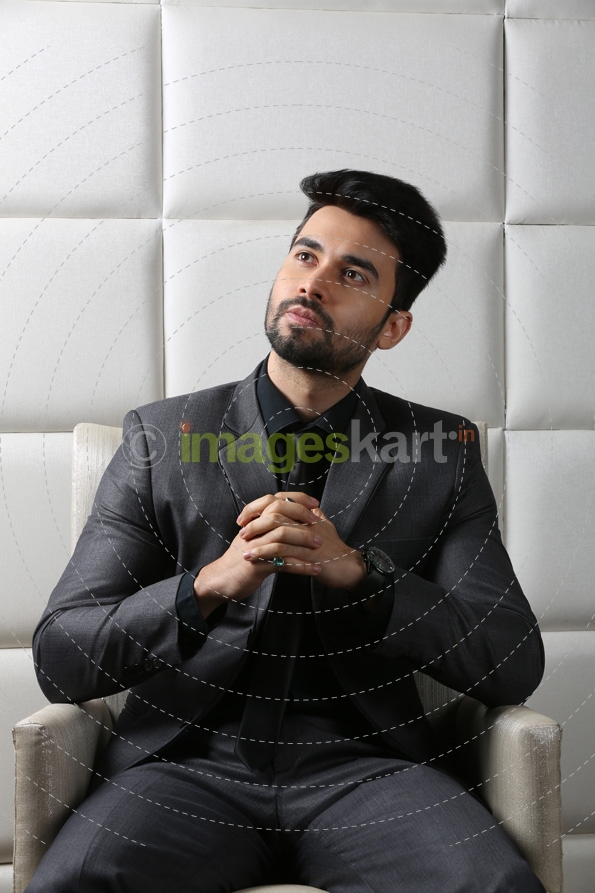 woman posing and sitting in formals