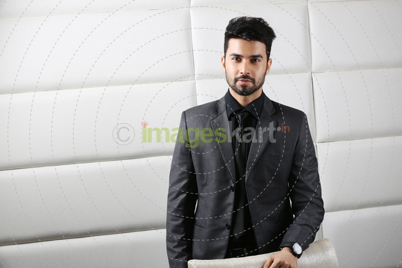 man in his cabin posing
