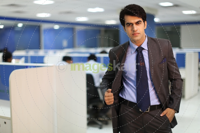 man posing in formal wear
