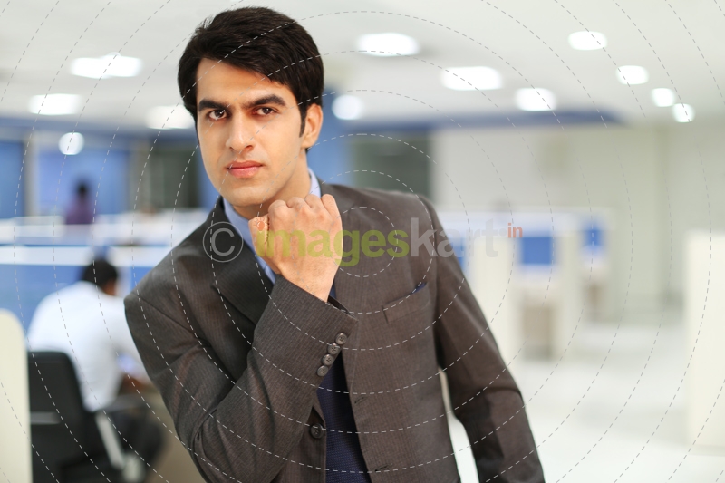formally dressed man in office
