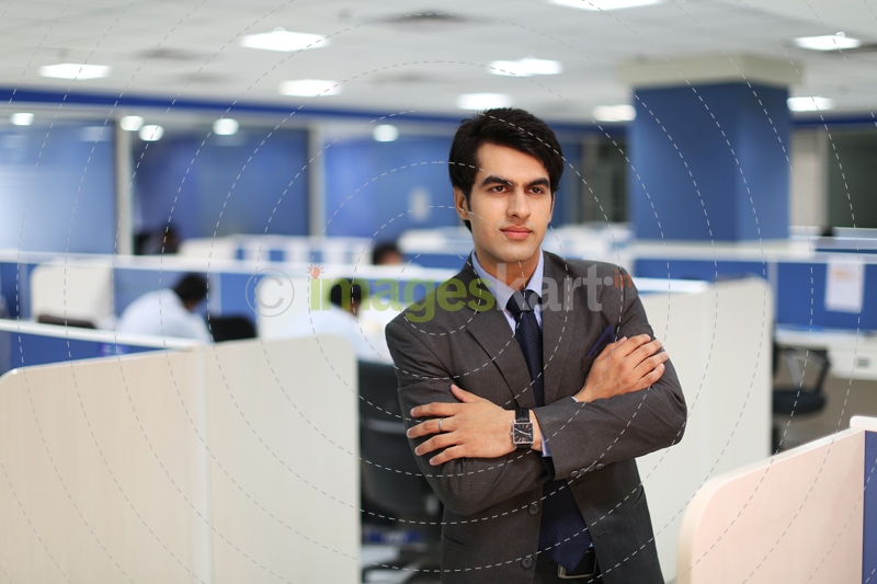 man in formals folding hands