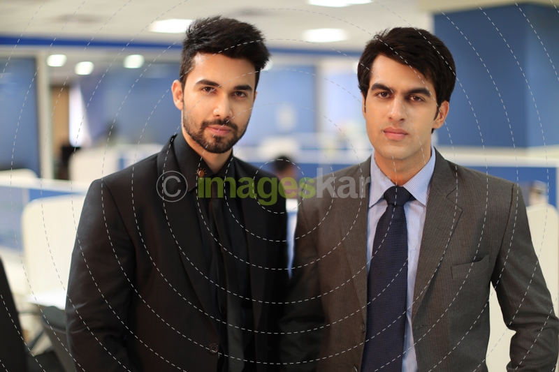 men in formals standing 