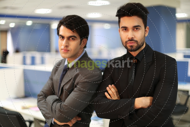 professional men with hands folded