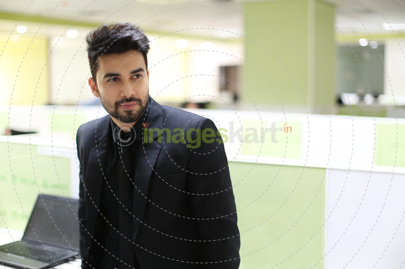 man in formal wear posing 
