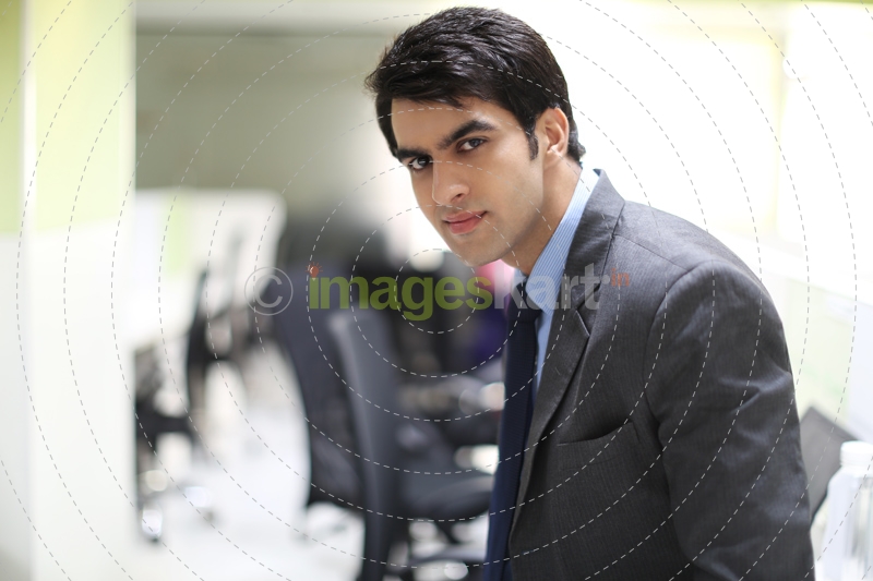 man in formal wear posing 