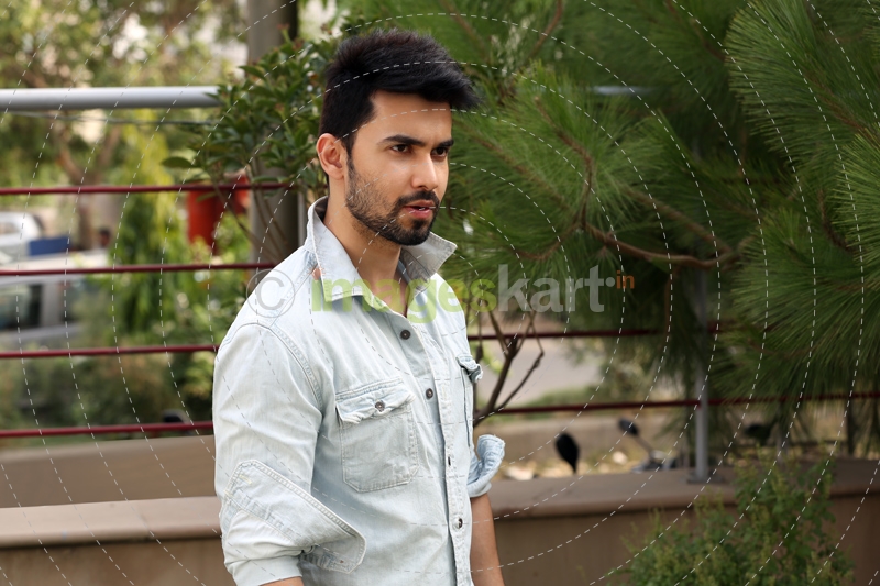 man in formals standing outside 