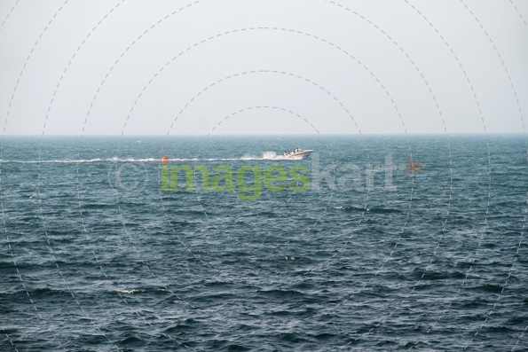beautiful sea with boat in the middle of the sea 