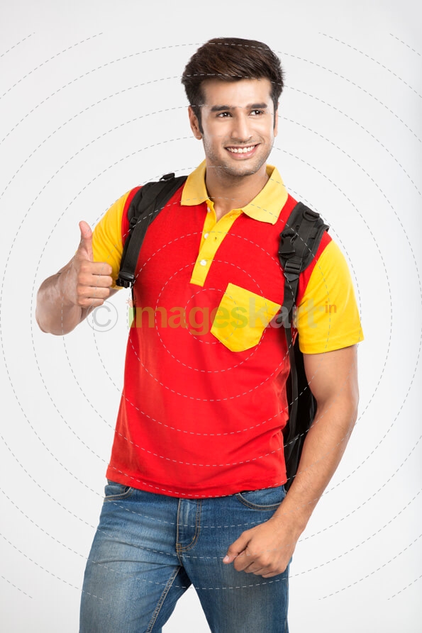 guy with backpack showing thumbs up 
