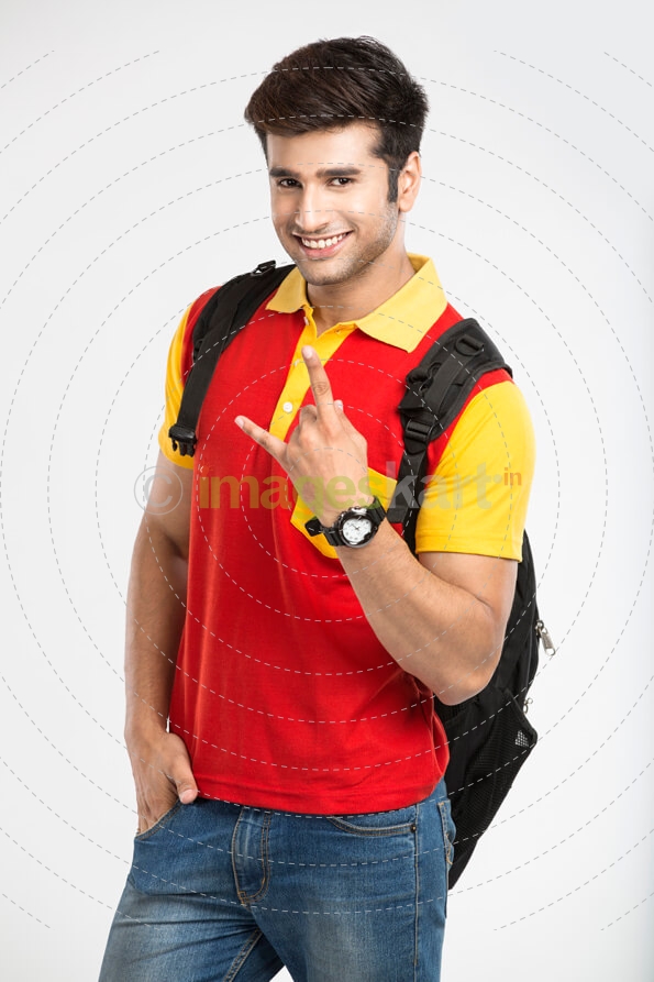 young guy smiling while gesturing in style 