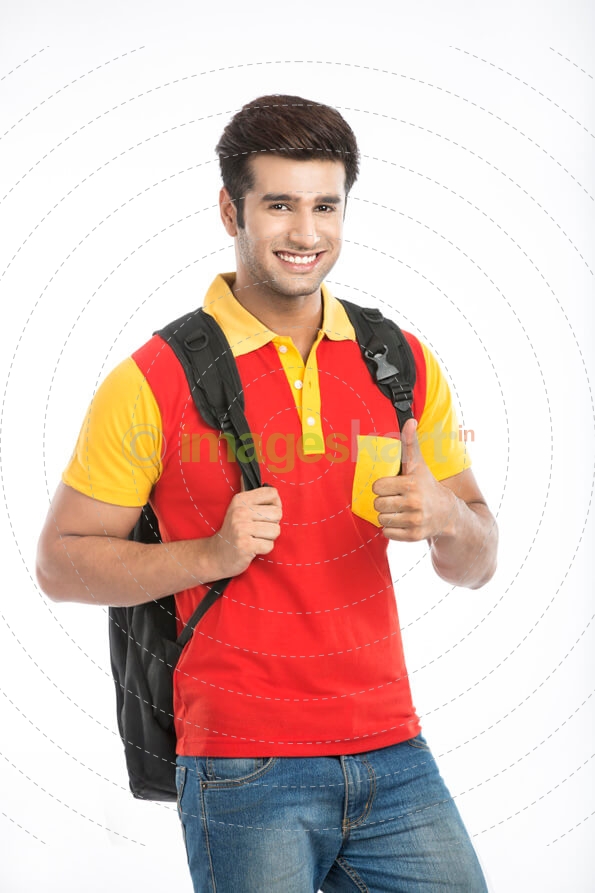 guy showing thumbs up with one hand and holding bag strap with other h