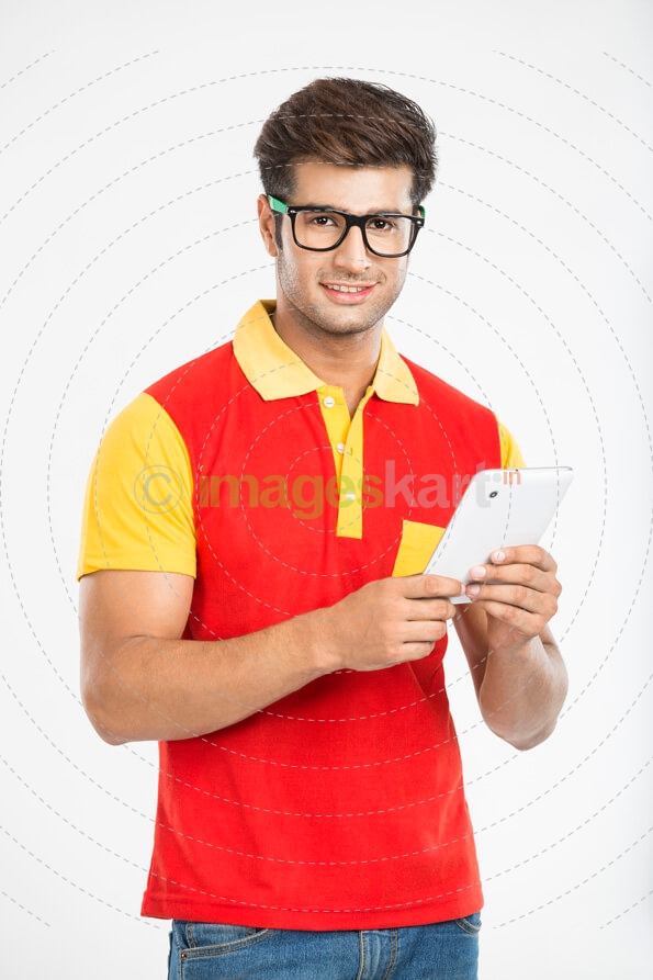guy smiling and posing with tablet 