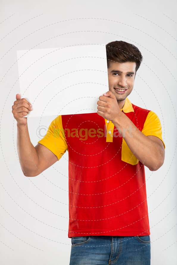 man posing with placard