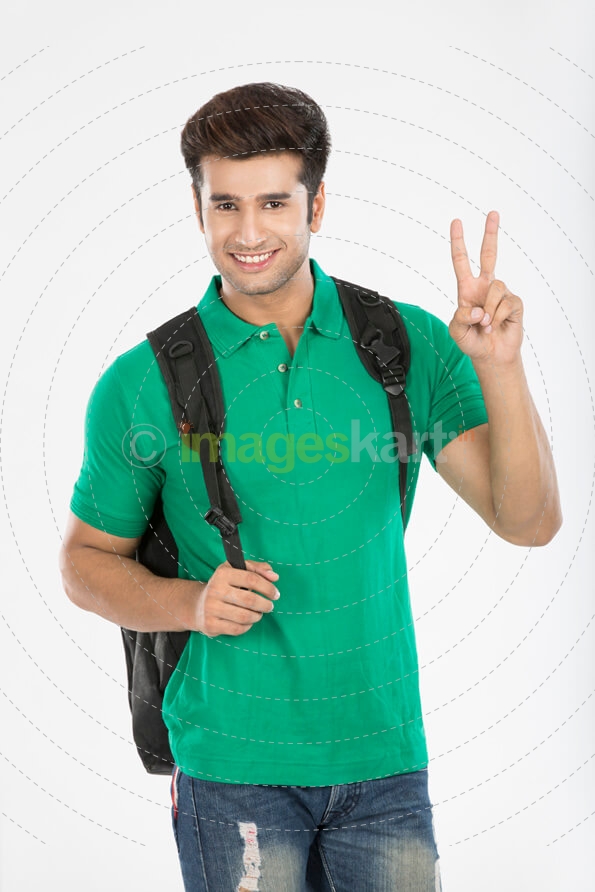 guy posing while showing victory sign